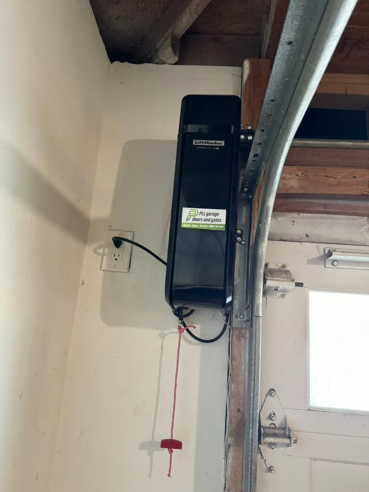 Wall-mount garage door opener installed by PLL Garage Doors and Gates